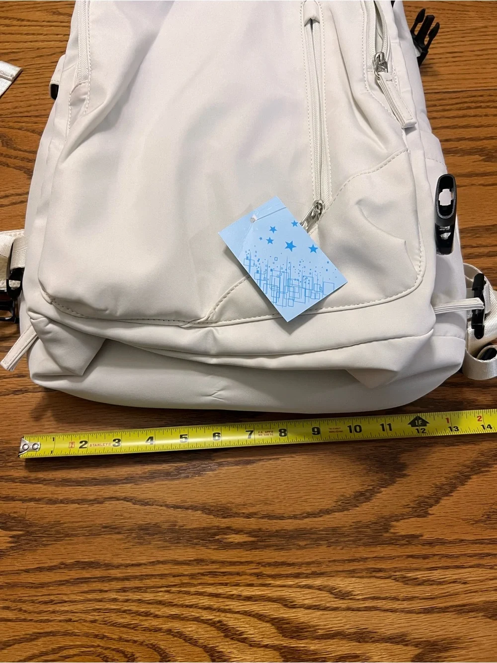 Off White Everyday Backpack with Front Zip Pocket!  Lots of pockets!